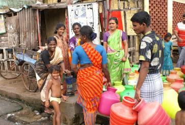 People getting water in India
