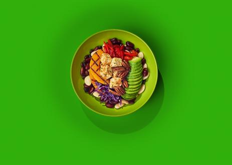 Climate-friendly meal on green background