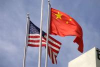 Flags from the United States and China.