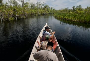 Local people from Takal Pasir Village conducting a survey of the Singkil peat swamp forest.
