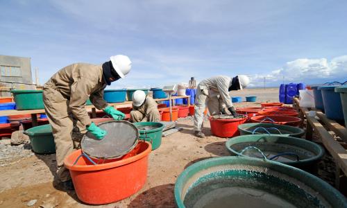 Workers extracting lithium in Bolivia.
