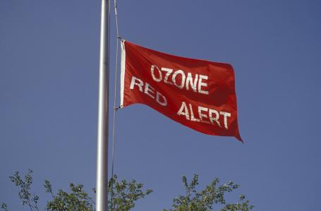 A Red Zone Alert flag is raised on a summer day in the Washington, D.C. metro area. The warning is an indicator of poor air quality, when it is considered unhealthy to breathe for extended periods.
