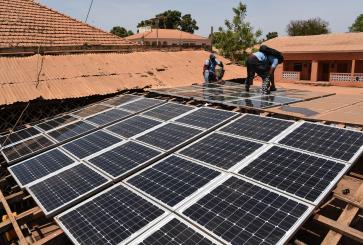 Solar panel installation and rural development in the Gabu region.