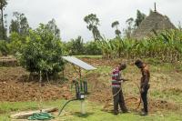 Setting up a solar-powered water pump to pump groundwater in Ethiopia.
