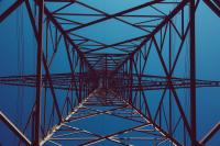 Transmission tower against a blue sky